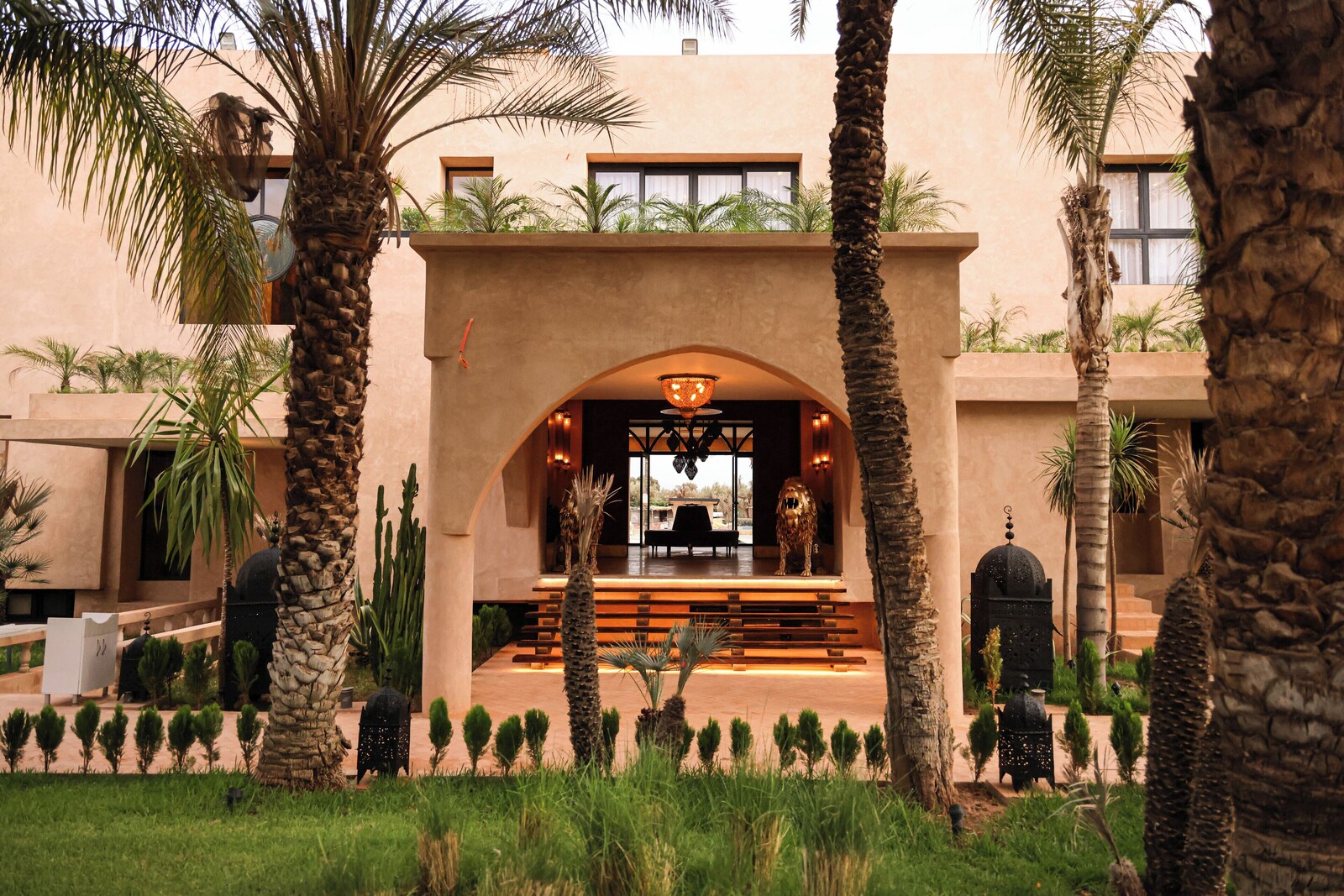 Garden and arched architecture by day near Marrakech